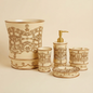 Vivian Beige accessories set vanity vignette — champagne ivory pieces with gold arabesque embossing styled with roses, candles and gold mirror