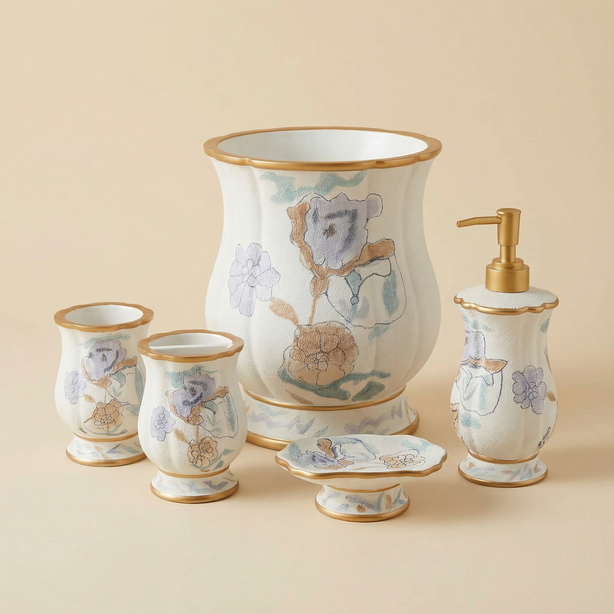 Judy accessories set Blue — 5-piece blue and grey watercolor floral ceramic vanity set with gold rim on marble counter beside white flowers and neutral towel