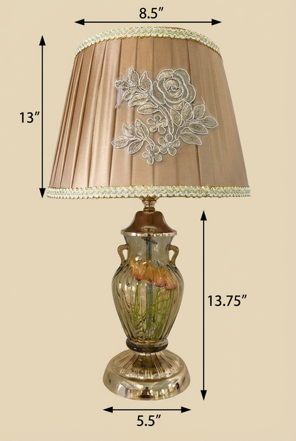 Antique Urn Rose Table Lamp with dimensions — 26.75 inch total height with 13 inch champagne embroidered rose shade and 13.75 inch smoky green floral glass urn body, 8.5 inch shade width and 5.5 inch base on beige background