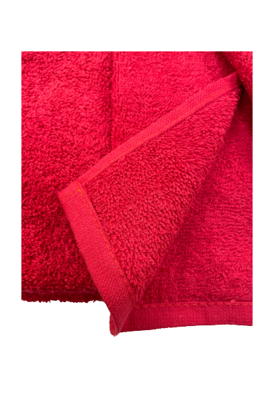 Venezia Red 3-piece towel set — deep crimson red plush bath towel, hand towel and washcloth draped on heated silver towel rail in white bathroom