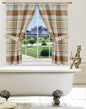 Ivanna Window Curtain Beige — woven horizontal multi-stripe panel with valance and tie-backs in sand, brown and grey tones, styled at bathroom window above clawfoot tub