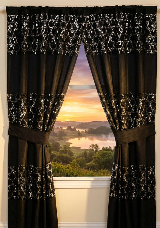 Sinatra Black window curtain — dramatic deep black fabric with dazzling silver sequin medallion ring embroidery bands, valance and tie-backs with scenic sunset view through window