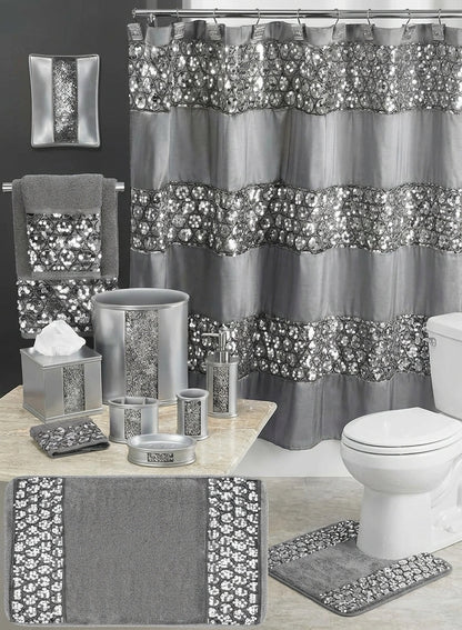 Sinatra Black shower curtain — dramatic black fabric with dazzling silver sequin medallion ring embroidery bands beside black V-chevron mosaic ceramic accessories and black bath rug with sequin border